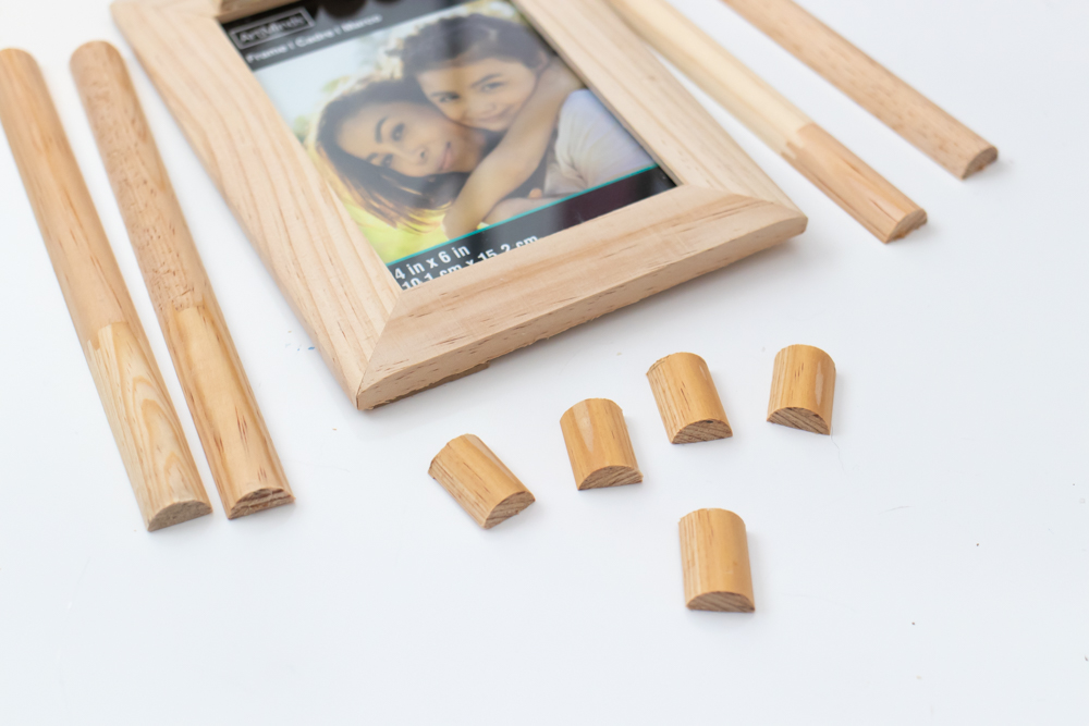 pieces of half circle trim cut to frame size