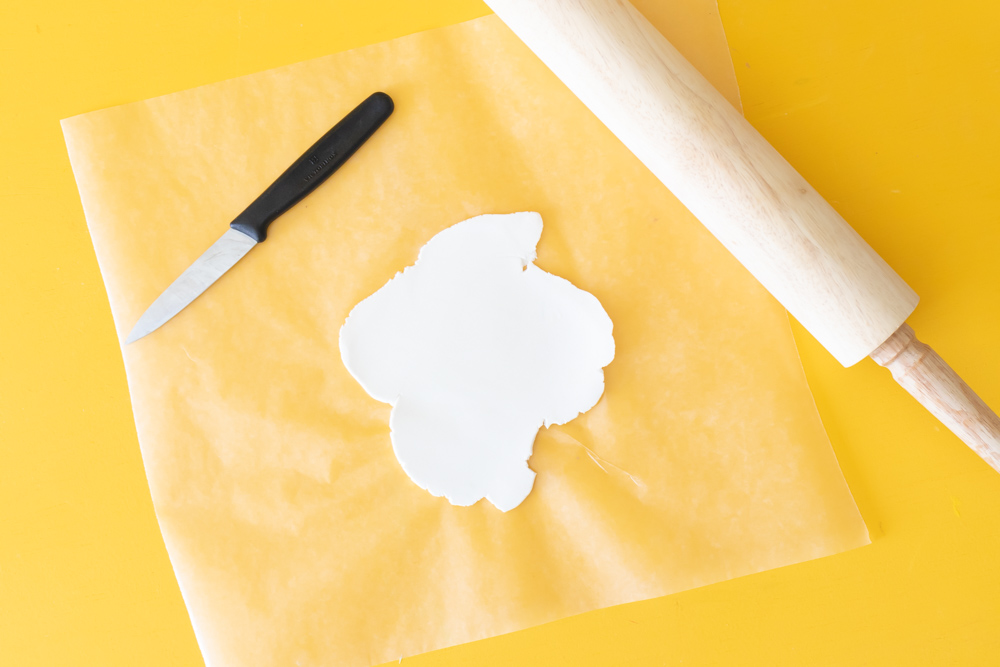 Flat rolled piece of white clay