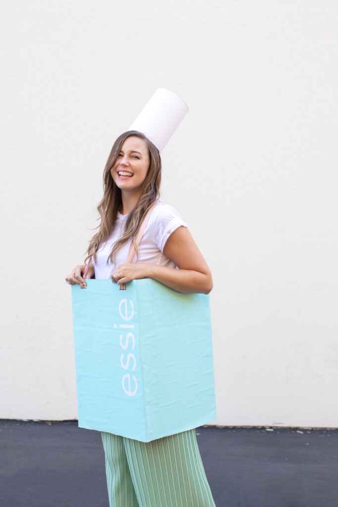 woman wearing box nail polish costume