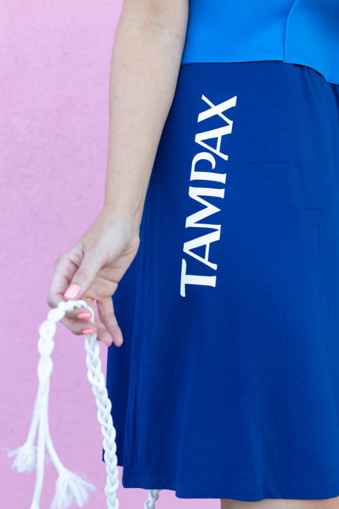 holding Tampax LeakGuard Braid for tampon costume