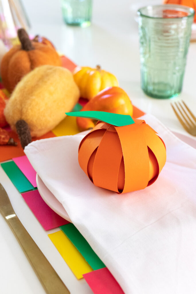 paper pumpkin treat placecard on plate