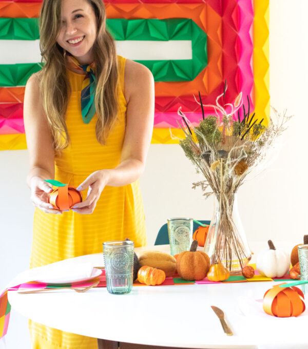 Use vibrant cardstock from the ASTROBRIGHTS Mega Collection Retro Cardstock Assortment to make DIY paper decor this Thanksgiving! No matter the celebration, this easy 3D paper mural, woven table runner and pumpkin treat placecards will be perfect for decorating your table for guests. You'd be amazed what you can make with a pack of cardstock! #ad #papercrafts #murals #paperdecor #paperparty #thanksgiving #thanksgivingdiy #thanksgivingcrafts #holidaycrafts #partycrafts #diyparty #papermural #treatbags #diyplacecards