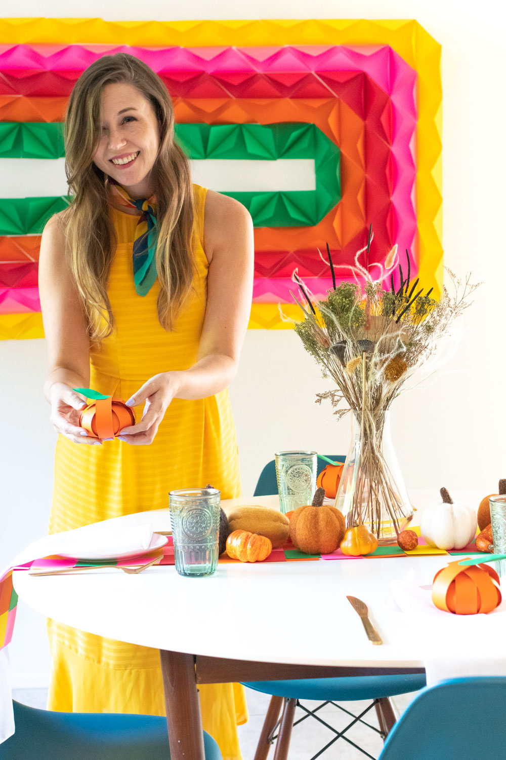 Use vibrant cardstock from the ASTROBRIGHTS Mega Collection Retro Cardstock Assortment to make DIY paper decor this Thanksgiving! No matter the celebration, this easy 3D paper mural, woven table runner and pumpkin treat placecards will be perfect for decorating your table for guests. You'd be amazed what you can make with a pack of cardstock! #ad #papercrafts #murals #paperdecor #paperparty #thanksgiving #thanksgivingdiy #thanksgivingcrafts #holidaycrafts #partycrafts #diyparty #papermural #treatbags #diyplacecards