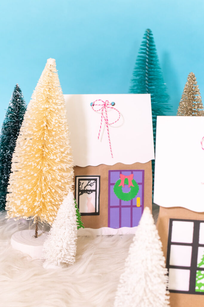 decorated lunchbag as gingerbread house gift bag