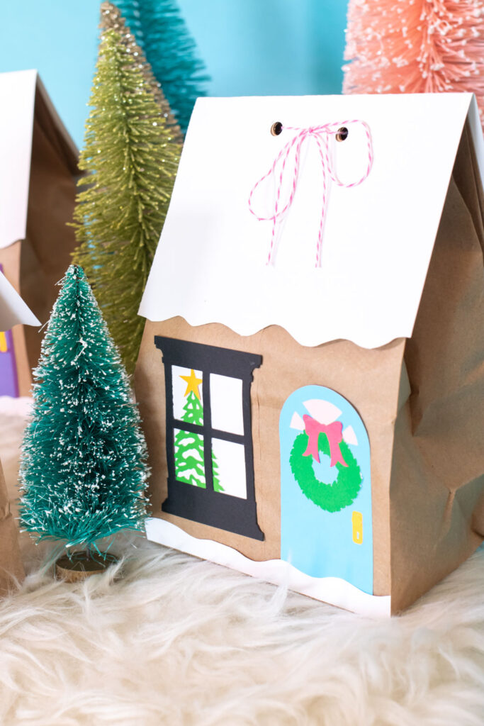 door and window glued onto paper lunchbag for gift bag