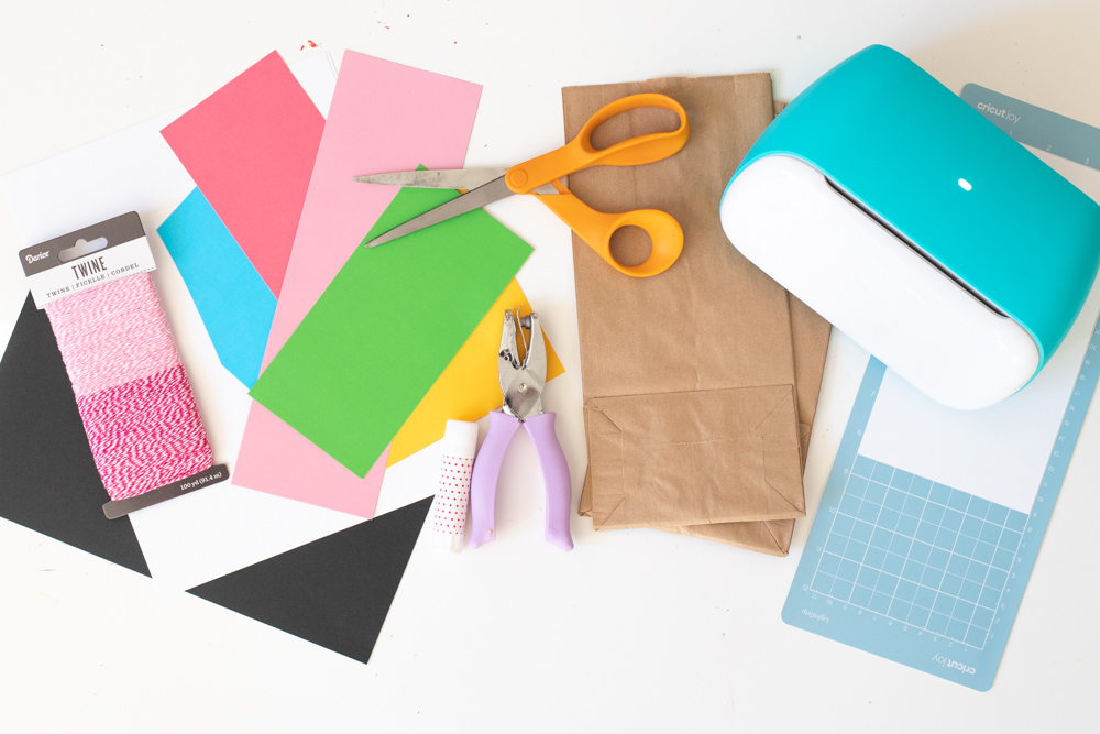supplies for making gingerbread house paper gift bags with Cricut