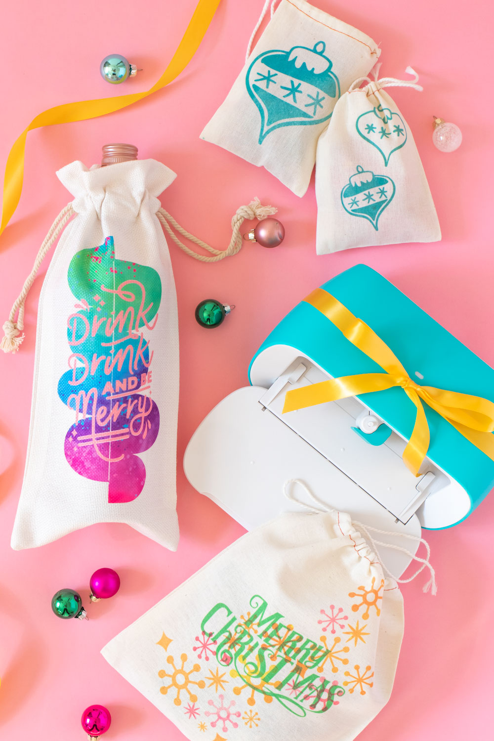 assortment of DIY holiday gift packaging ideas made with Cricut and vibrant colors
