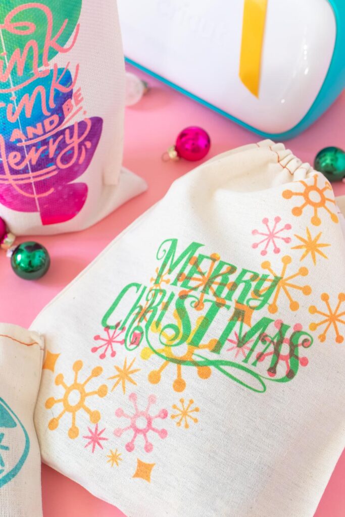 closeup of retro text design on holiday gift packaging with Cricut Joy