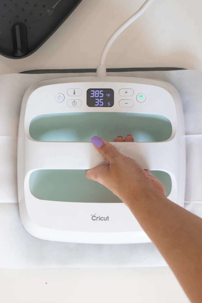 applying heat to a design with Cricut EasyPress
