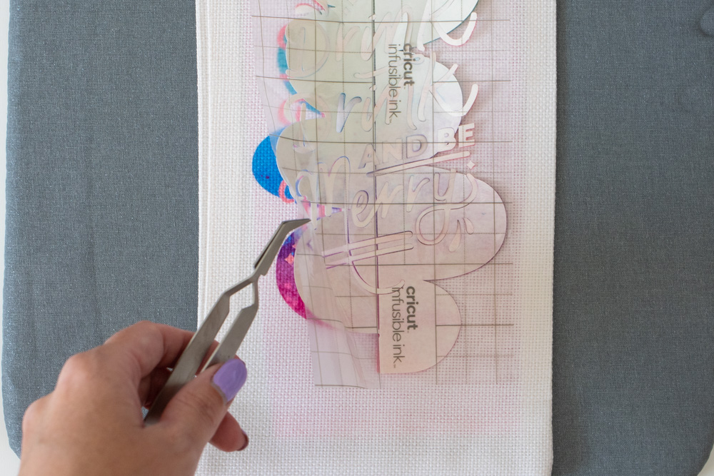 peeling away background of Infusible Ink