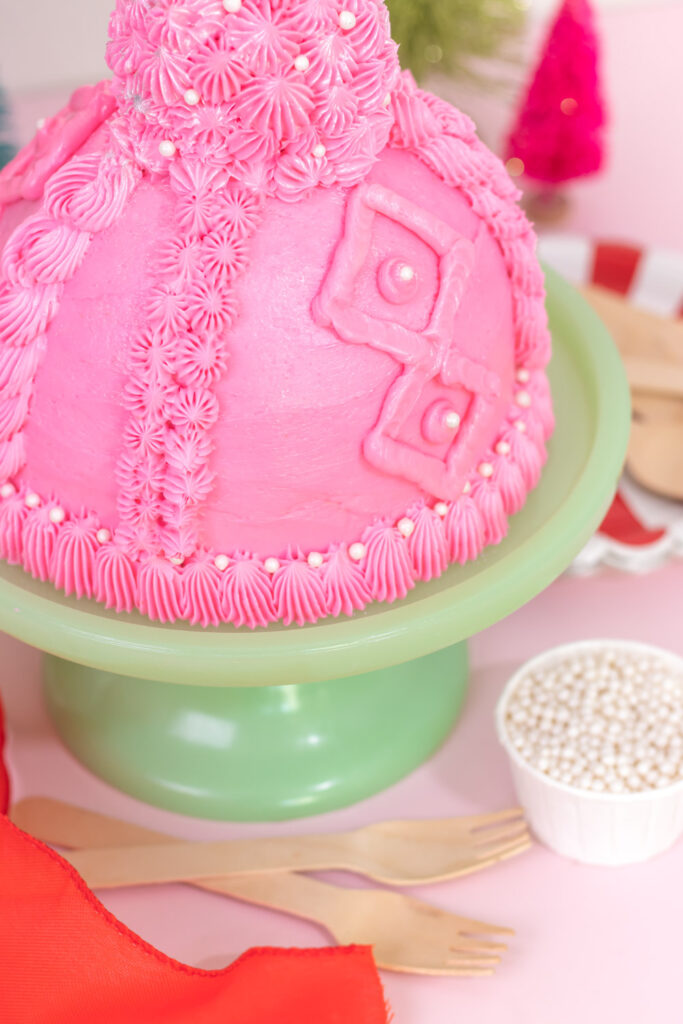 side view of details on easy knit beanie cake with buttercream