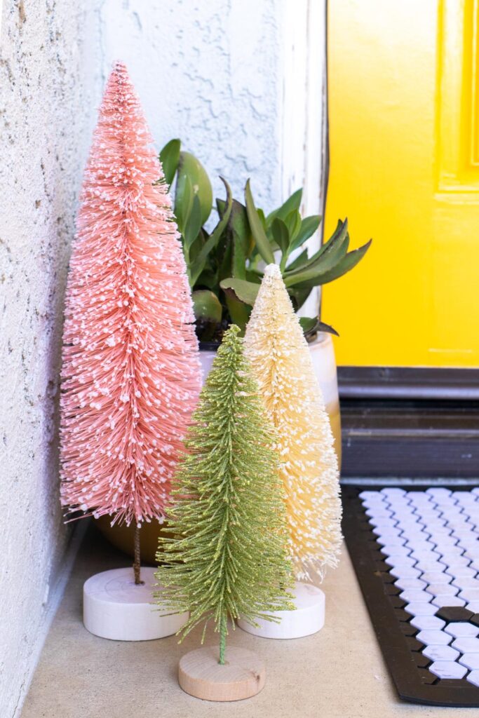 bottlebrush trees and plant in budget friendly front porch holiday makeover
