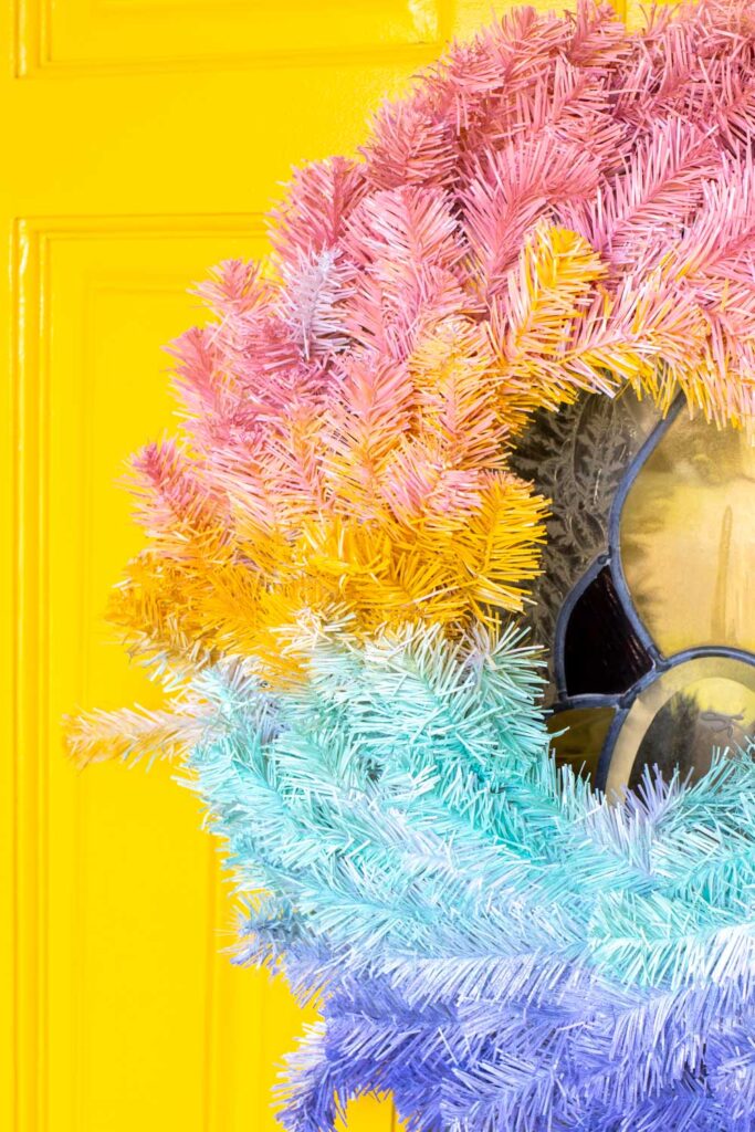 closeup of gradient wreath on bright modernized front door