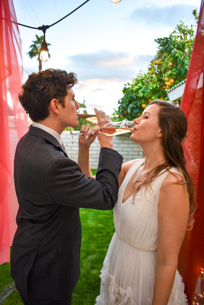 wedding champagne toast at dusk