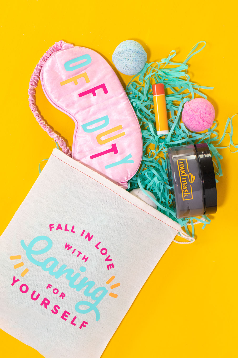 DIY self care gift basket with supplies falling out, decorated with vinyl