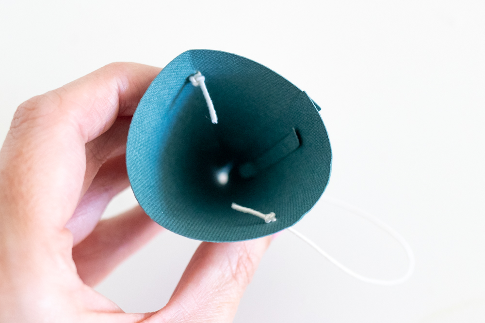 tying elastic to mini party hat