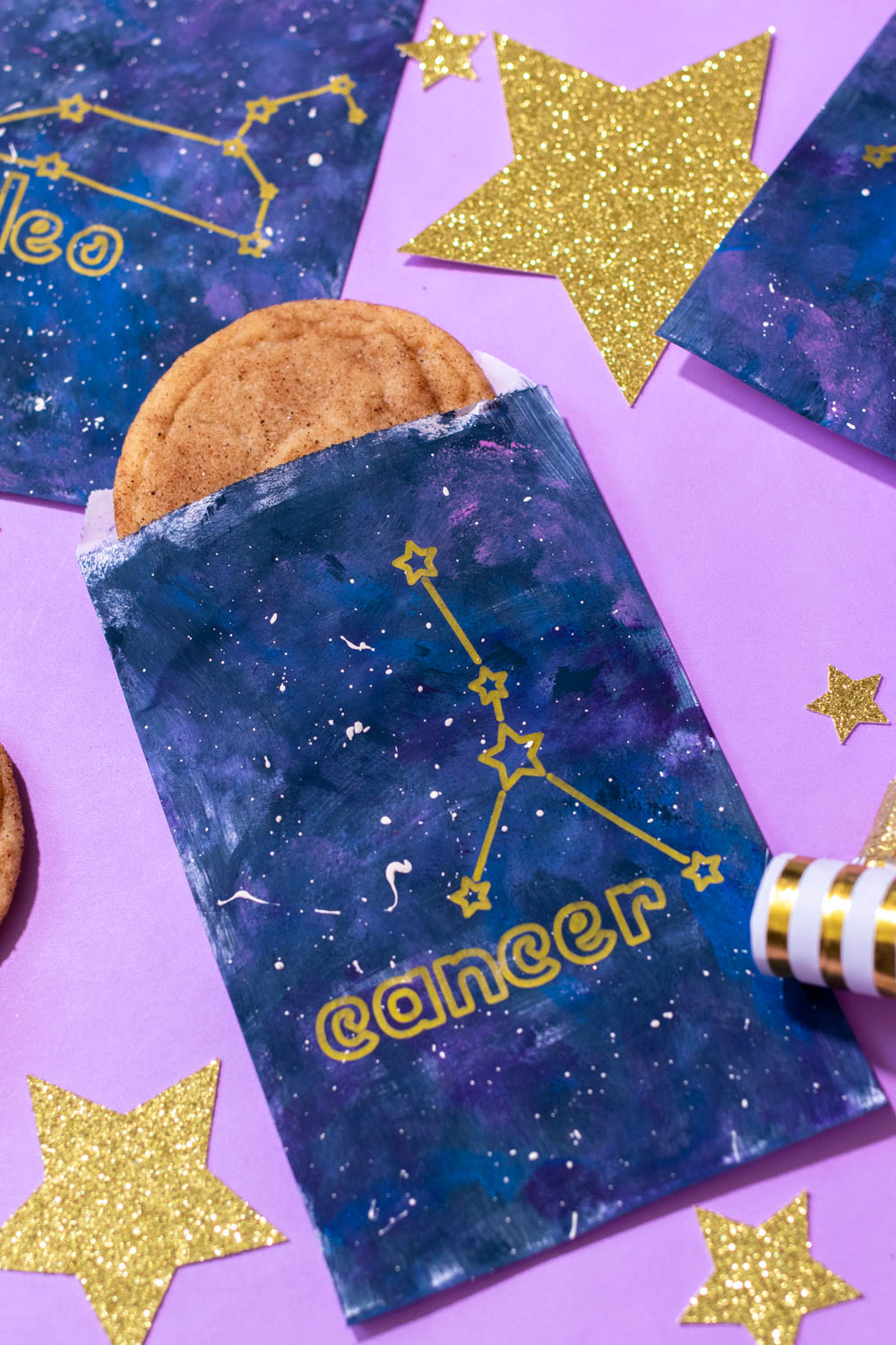 cancer zodiac-themed treat bag on purple with stars