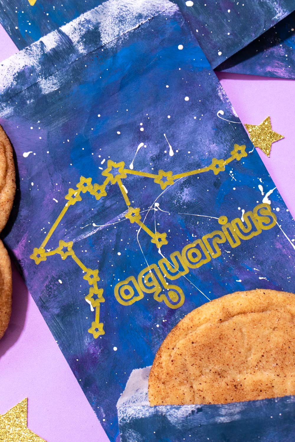 closeup of aquarius zodiac treat bag on purple background